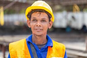 Portrait of factory worker man in hard hat at the precast factory site, Worker man on construction site photo