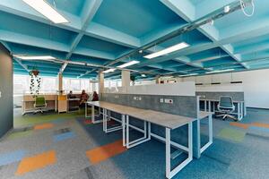 Photo of a modern office where programming, digital marketing and web design projects are done. Office with modern furniture and glass office