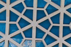 Architectural detail texture background with oriental hexagonal grid pattern photo