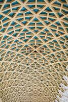 Architectural detail texture background with oriental hexagonal grid pattern photo