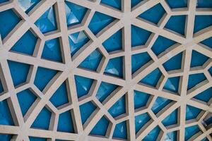 Architectural detail texture background with oriental hexagonal grid pattern photo