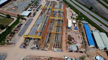 Aerial view of a cement bridge under construction. Road currently under construction at several levels to increase traffic video