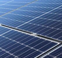 Generating clean energy with solar modules in a big park in nort photo
