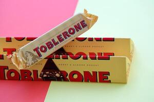 KYIV, UKRAINE - OCTOBER 31, 2023 Yellow Toblerone Chocolate Bar. Toblerone originated in Switzerland around 1908 photo
