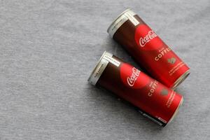 KYIV, UKRAINE - OCTOBER 31, 2023 Can of Coca Cola with coffee flavor. Closed tin can of drink with special design photo