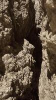 A very large rock formation with some rocks sticking out of it video