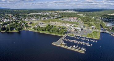 Aerial View of a Lac-Megantic, Quebec, Canada, With Boats Docked on the harbor on a Sunny Day photo
