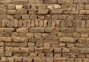 Clay mud brick wall for background photo