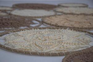 Knitted mandala in a circular frame photo