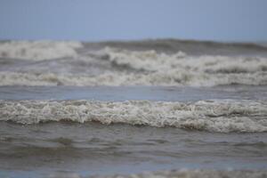 Beautiful and calm waves of the sea photo