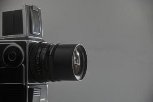 Evora, Portugal. May 15, 2010.A Hasselblad camera, iconic in its design, rests elegantly against a sleek gray backdrop, embodying sophistication and creativity. photo