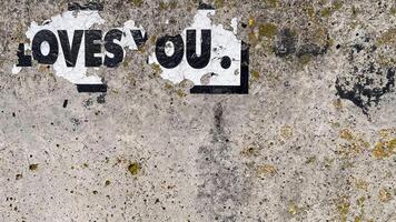 Torn paper on wall with 'LOVE YOU' message, expressing affection and emotion. Perfect for romantic concepts. photo