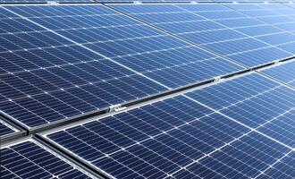 Generating clean energy with solar modules in a big park in nort photo