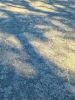 View of road asphalt with many cracks and potholes in urgent need of repair. photo