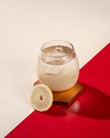 Lemon honey ice is a mixture of mineral water with lemon juice and honey photo