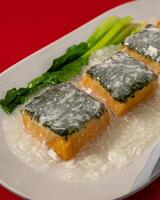 Vegetable tofu drizzled with egg sauce photo