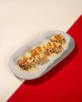 Cheese fried bananas are bananas that are dry fried and then sprinkled with cheese and milk photo