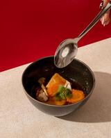 Sapo tofu is a type of dish originating from China that is cooked with vegetables photo