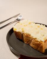 Roti burn is a typical grilled Indonesian sandwich, consisting of two slices of bread and stuffed with egg and mayo photo