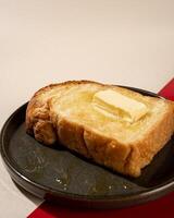 Steamed bread is a type of bread, usually made from wheat, that is prepared by steaming, rather than baking, with a filling of honey and butter. photo