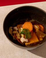 Sapo tofu is a type of dish originating from China that is cooked with vegetables photo