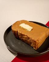 Roti burn is a typical grilled Indonesian sandwich, consisting of two slices of bread and peanut butter filling photo
