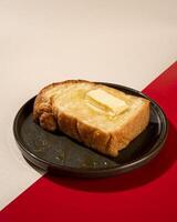 Steamed bread is a type of bread, usually made from wheat, that is prepared by steaming, rather than baking, with a filling of honey and butter. photo