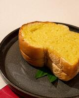 Steamed bread is a type of bread, usually made from wheat, which is made by steaming it with butter photo