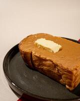 Roti burn is a typical grilled Indonesian sandwich, consisting of two slices of bread and peanut butter filling photo