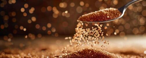 A superrealistic image of date sugar granules being poured from a spoon photo