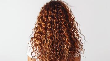 Woman with long curly hair, styled perfectly, capturing the essence of curl definition, isolated on white photo