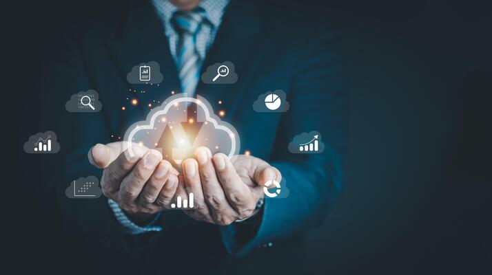 Businessman hand holding Cloud computing technology internet storage network. Cloud service, Cloud technology, and Cloud storage Concept.