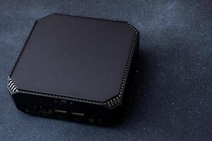 A small system unit of a personal computer. Compact device. photo