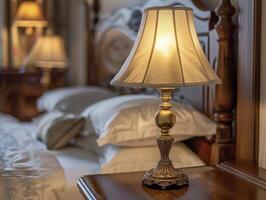 Classic Bedroom With A Traditional Brass Night Lamp On A Polished Wooden Table, Natural Colors photo