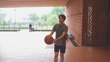 Men take a walk to relax after playing basketball in a public area, having fun and practicing at the same time. video