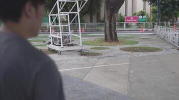 Men and women play basketball alone in public areas for fun and practice at the same time. video