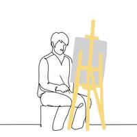 male artist sits at an easel with a brush in his hand, peering at the canvas in front of him - one line art . concept of thoughtfulness in the process of painting a picture vector