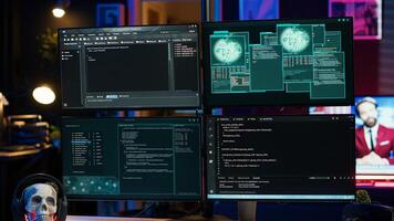 Close up of dangerous hacking lines of code running on computer monitors in criminal den. Programming scripts shown on PC displays in empty hideout used by cybercriminals to steal data photo
