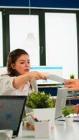 Woman company leader talking at diverse group board meeting, multiethnic team, professional management and clients discussing contract negotiating at conference office table photo