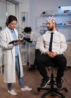 Neurologist woman monitoring brain evolution developing medical treatment for neurological disease in modern laboratory. Scientist doctor analyzing nervous system activity. Neurology service photo