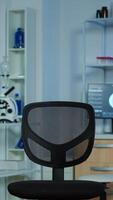 Neurological laboratory with nobody in it modernly equipped prepared for experiments development, examining brain functions, nervous system, tomography scan for scientific research. photo