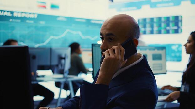 Chief executive officer presenting performance metrics numbers to shareholder on phone call, provide statistics about organizational progress to obtain more funds and increase budget. Camera B. photo