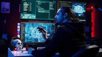 Hacker uploading sensitive data from SSD obtained from victim through ransomware virus, close up. Scammer inserting storage drive with stolen information from users, finishing evil plan, camera B photo