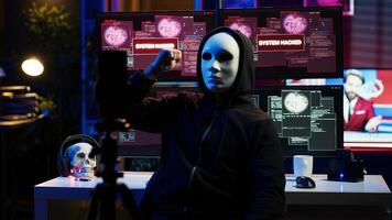 Dissident social justice crusader doing online activism, wearing anonymous masks and filming in underground bunker, blackmailing government after stealing secret military documents, camera A photo