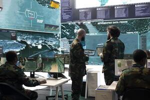 Privates team working with radar CCTV systems to detect enemy missiles, ensure national safety within their territory. Analyzing weather conditions to protect planned defense operations. photo