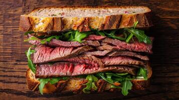 Top-Down Juicy Roast Beef Sandwich with Arugula photo
