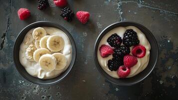 Fresh Yogurt Bowls with Sliced Bananas, Raspberries, and Blackberries photo