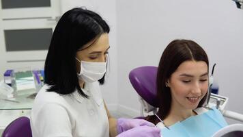Selection of the correct tooth color for professional cosmetic bleaching at the dentist video