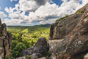 Panoramic view from high rocks in the Carpathian mountains, Tustan fortress. photo