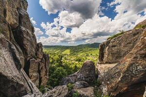 Panoramic view from high rocks in the Carpathian mountains, Tustan fortress. photo